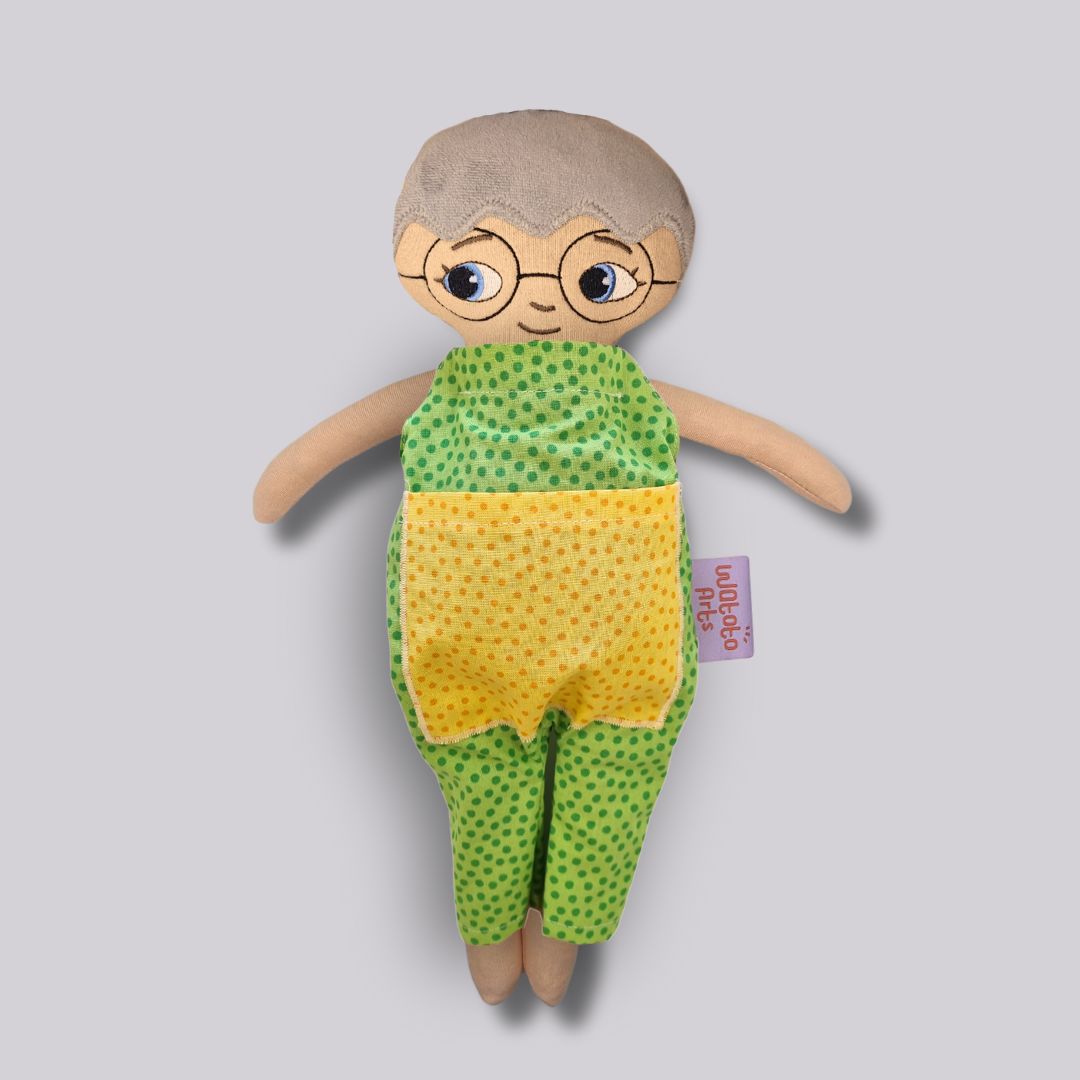 Docka Greta med kort hår och glasögon