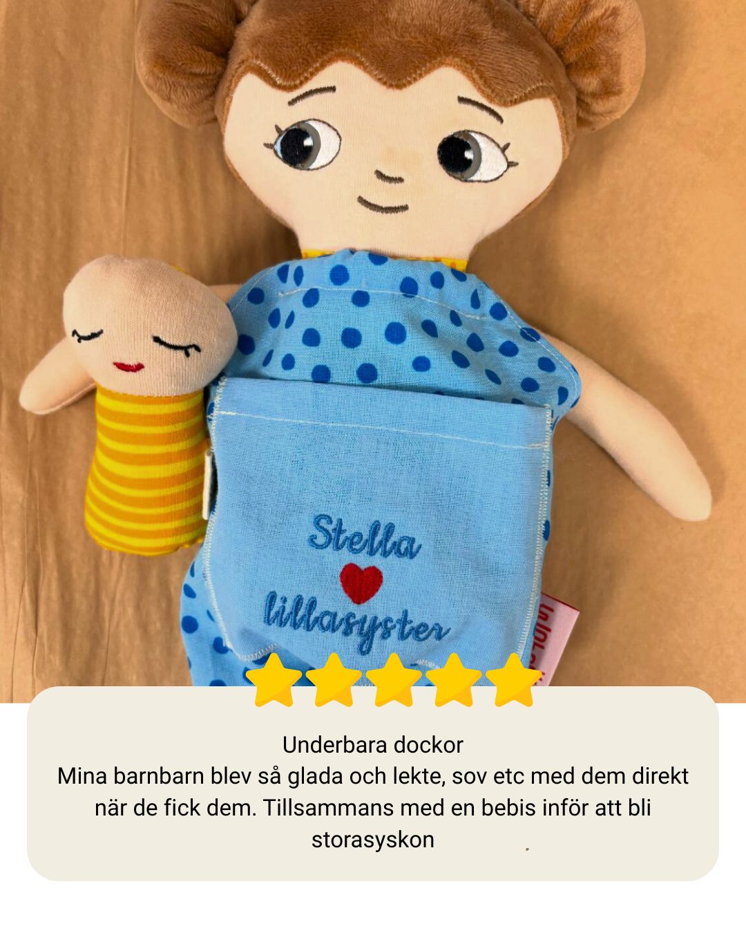 mjuk docka Minna i blå jumpsuit och en bebis docka