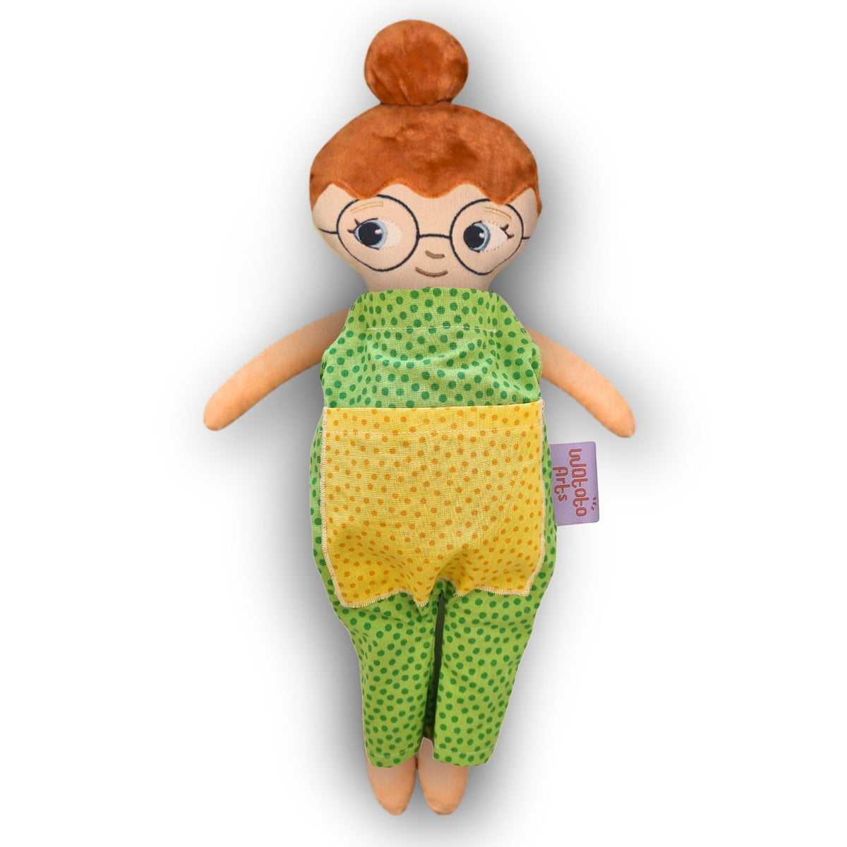 Dockan Mia med glasögon, rött hår i en hårknut och grön jumpsuit.