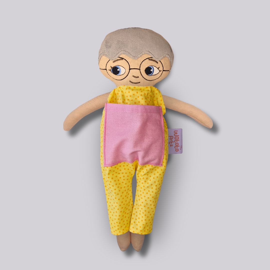 Docka Greta med kort hår och glasögon